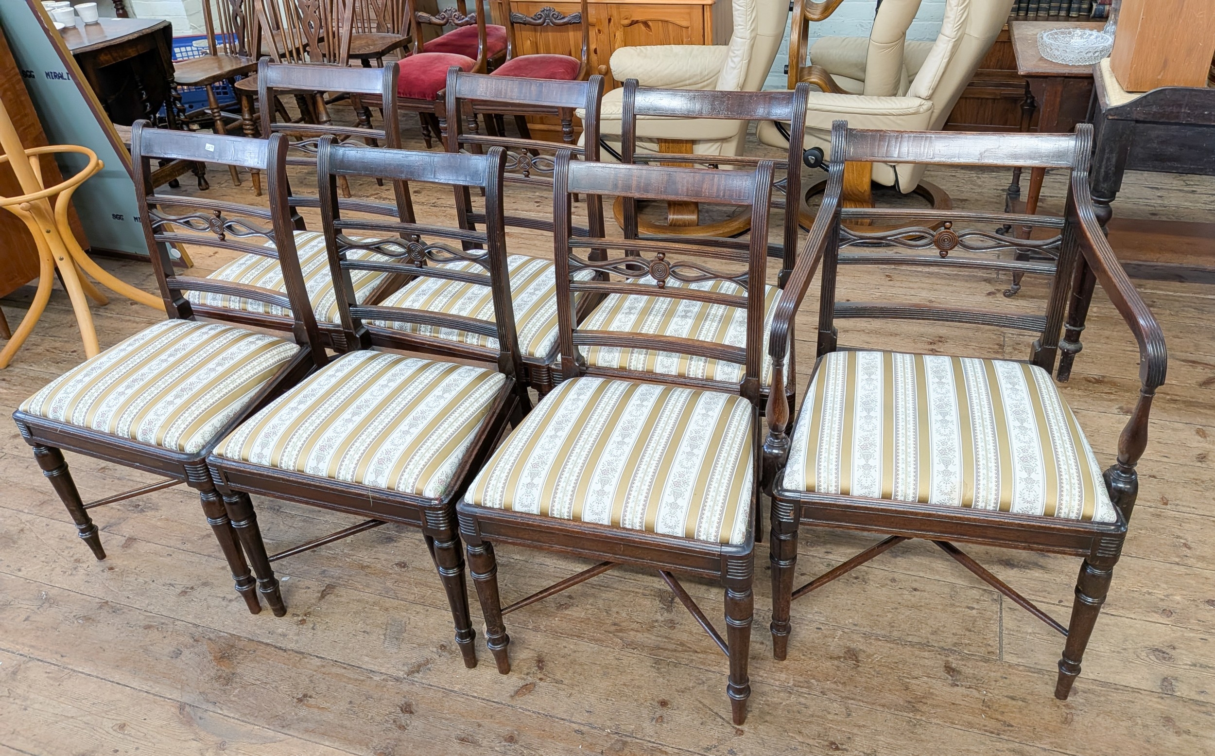 A set of six Regency style mahogany dining room chairs with striped ...