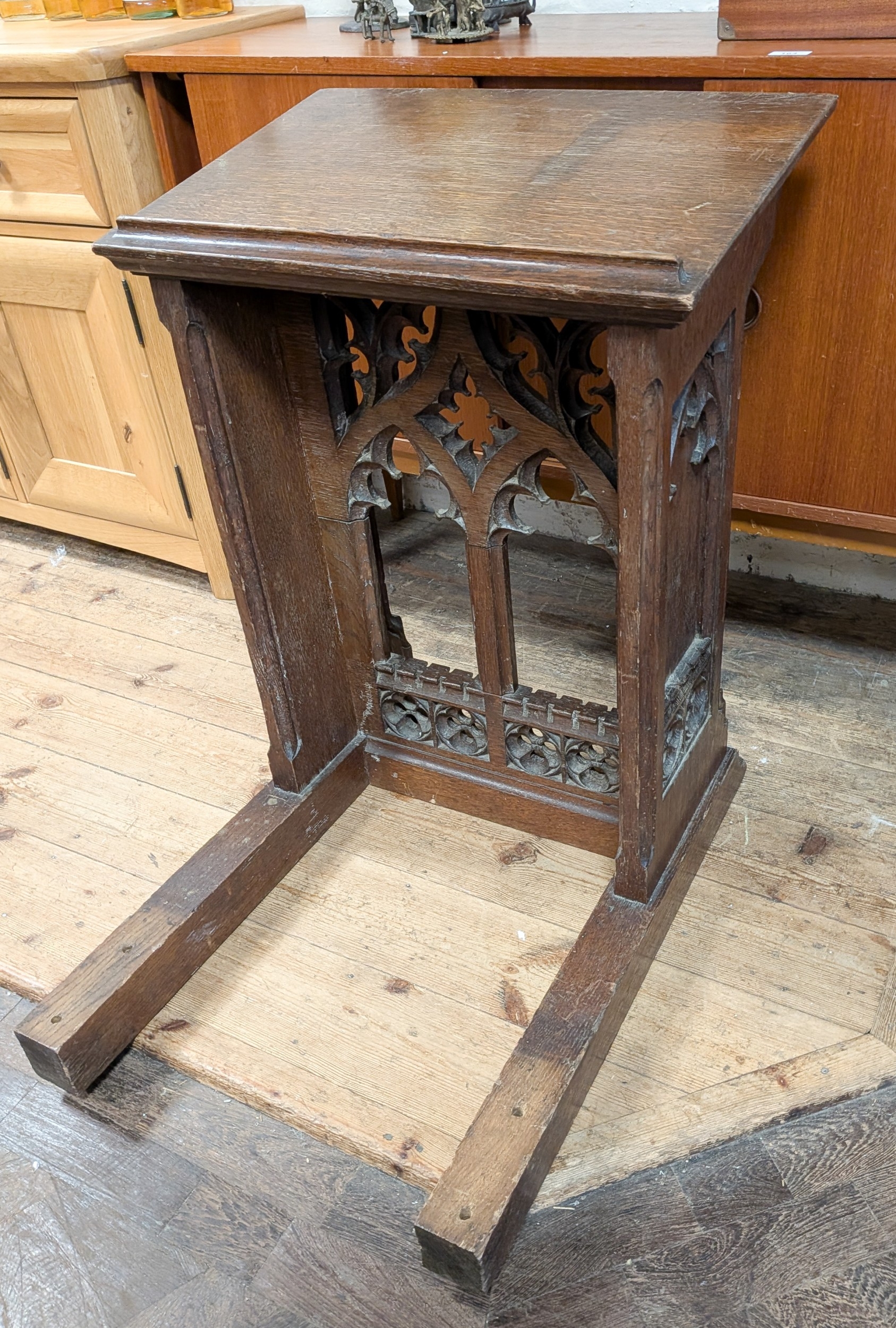 A gothic carved oak lectern