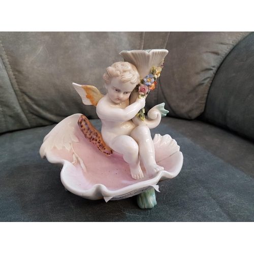 7 - Continental Porcelain Candle Stick with Cherub on Scalloped Dish and Floral Decoration