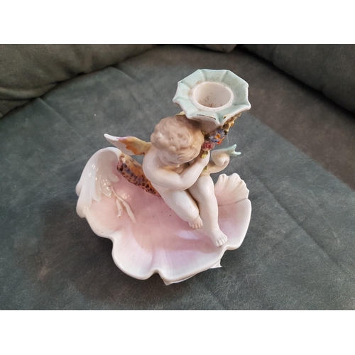 7 - Continental Porcelain Candle Stick with Cherub on Scalloped Dish and Floral Decoration