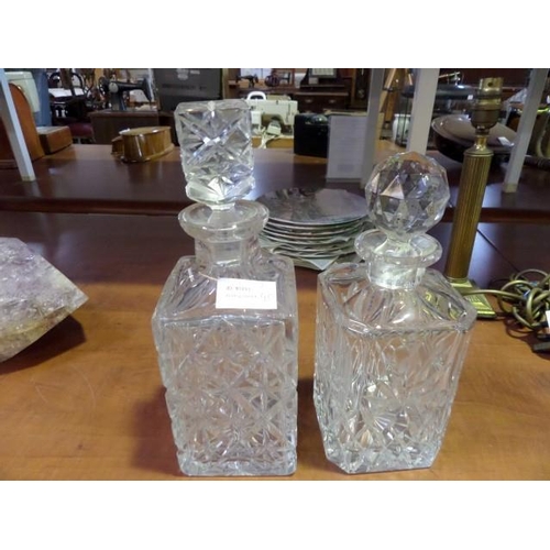 884 - 2 x Crystal Decanters, Square & Round Stoppers