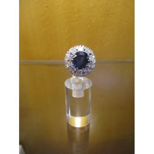 204 - A Large 4.5ct Sapphire surrounded by 3.2cts of Diamonds 18ct White Gold Ring