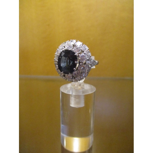 204 - A Large 4.5ct Sapphire surrounded by 3.2cts of Diamonds 18ct White Gold Ring