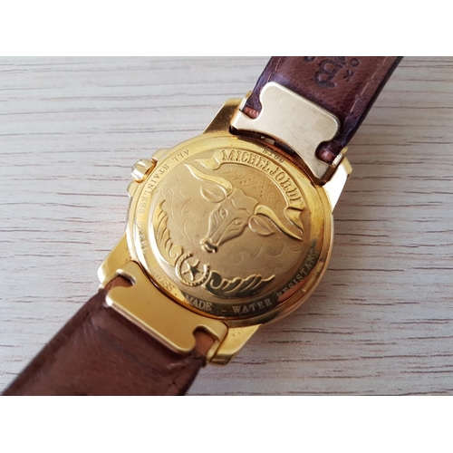 573 - Michael Jordi Gents Wrist Watch, Swiss Made, Date, Stainless Steel Case with Gold Colour Finish on T... 