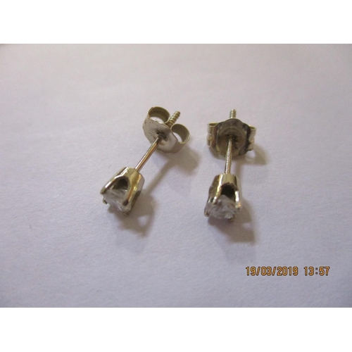 617 - 14ct White Gold Earrings Set with 2 x Genuine Brilliant Cut Diamonds - Total Weight 0.6gr