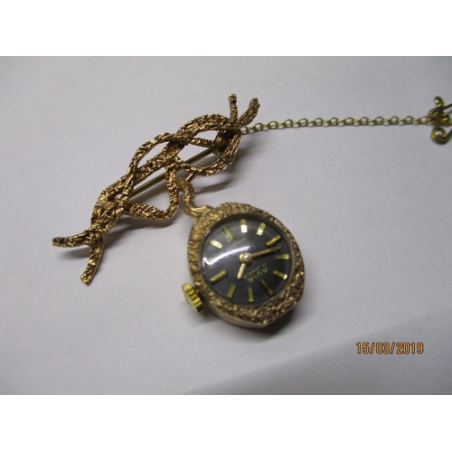 184 - 9ct Gold Ladies Watch AVIA, 17-Jewells Brooch in Block, 9.7gr