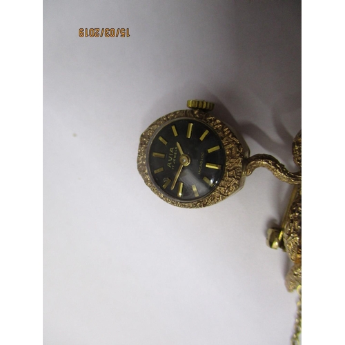 184 - 9ct Gold Ladies Watch AVIA, 17-Jewells Brooch in Block, 9.7gr