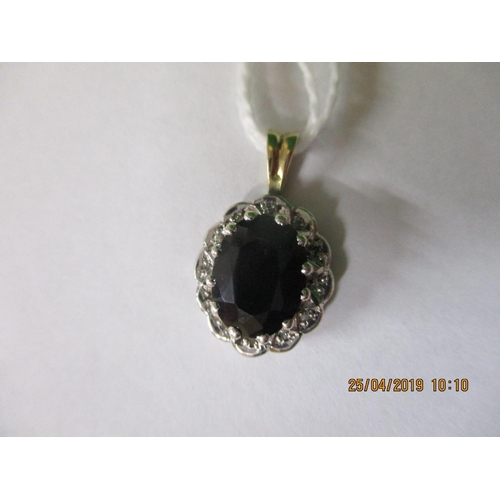 170 - 9ct Yellow /White Gold Pendant with Large Sapphire & 14 x Dust Diamonds, Total Weight: 2.1g