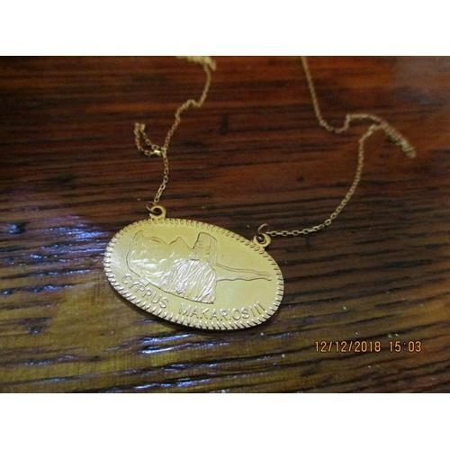 620 - 18ct Gold Arcbishop Makarios Pendant on 9ct Gold Chain