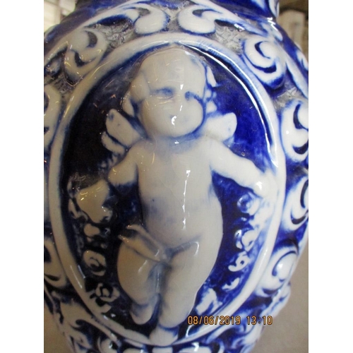 103 - Vintage Ceramic Blue / White Vase with Cherub Pattern