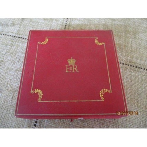 124 - Sterling Silver Powder Compact with Queen Elizabeth II Emblem, in a Cartier Box. The Seller states i... 