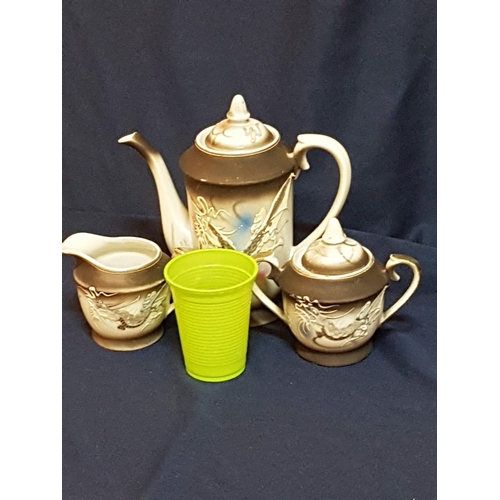 146 - Japanese Pattern Ceramic Tea Set; Tea Pot Cream Jar and Sugar Bowl