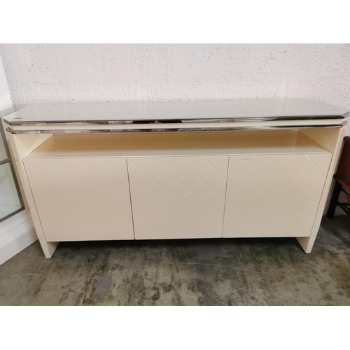 72 - Modern Cream White and Silver Console Unit with Tempered Glass Top, Shelf & 3 - Cupboards with Cross... 