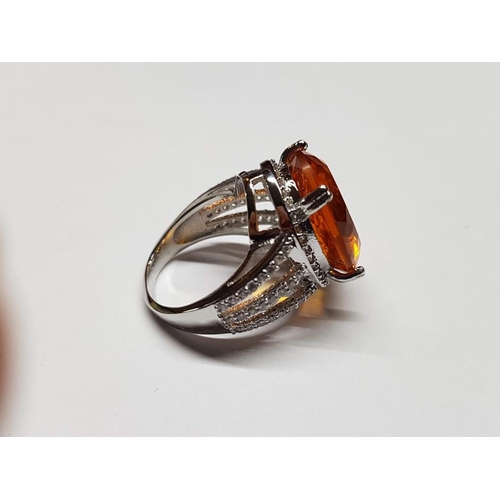 116 - Silver Ring with Large Citrine Colour Stone Surround by Clear Gemstones, Size M/N