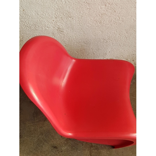 85 - Modern Red Plastic Chair