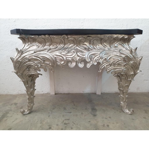 105 - A Console Table, Shaped Black Top on an Eleborate Silvered Base (120cm x 6cm x H:83cm) (Ref: FUR 801... 