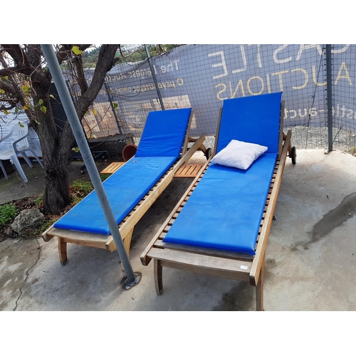 240 - 2 x Teak Wood Sunbeds with Slide-Out Drinks Tray and Blue Vinyl Cushions