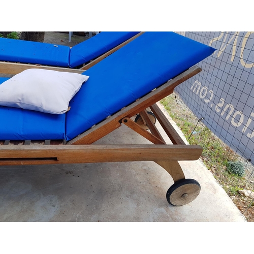 240 - 2 x Teak Wood Sunbeds with Slide-Out Drinks Tray and Blue Vinyl Cushions