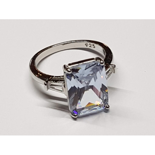 123 - White Metal Ring, Size R (19) with Large Rectangular Clear Stone