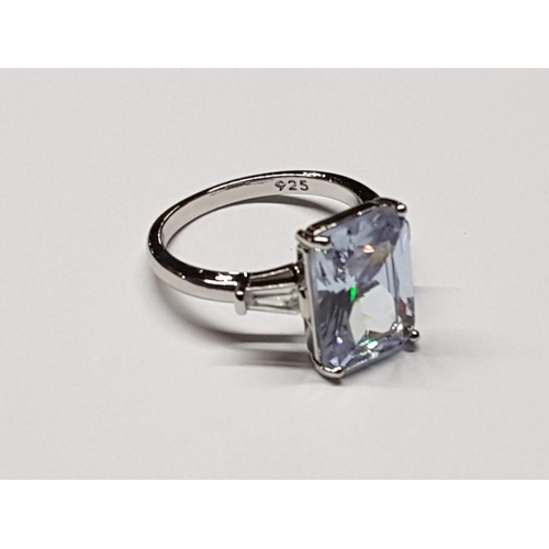 123 - White Metal Ring, Size R (19) with Large Rectangular Clear Stone