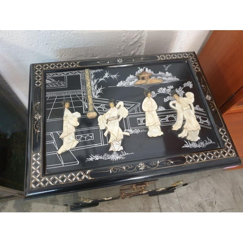 145 - Black Lacquered Chinese Unit with Lift up Top, 2 - Drawers and Cupboards, Decorated on the Top, Fron... 