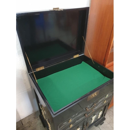 145 - Black Lacquered Chinese Unit with Lift up Top, 2 - Drawers and Cupboards, Decorated on the Top, Fron... 