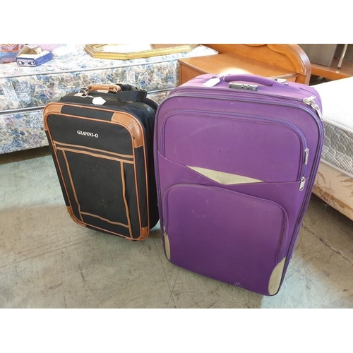 583 - 2 x Large Suitcases