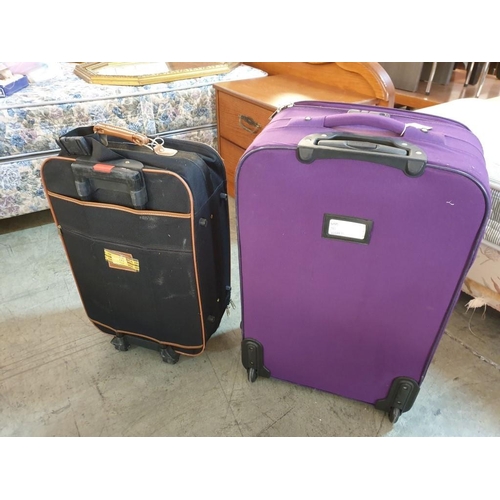 583 - 2 x Large Suitcases