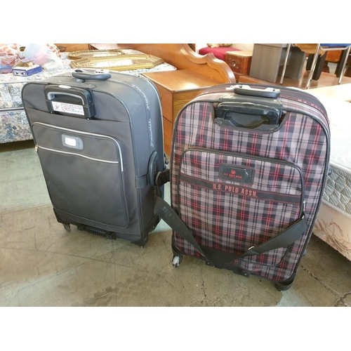 584 - 2 x Large Suitcases