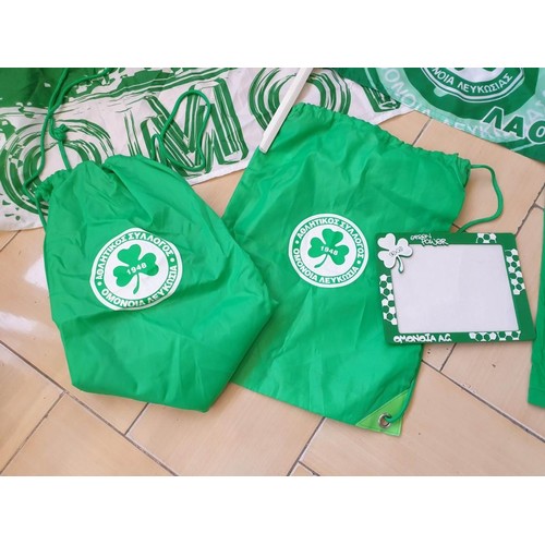 32 - Collection of Omonoia Football Club Items; Flags, Bag, T-Shirts etc