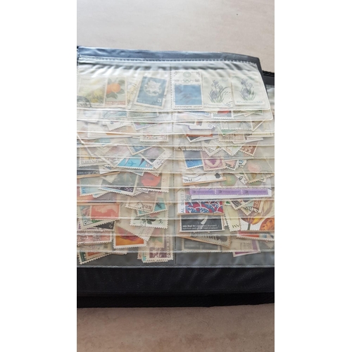330 - Album with Large Collection of Stamps from Around the World