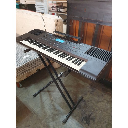 222 - Roland E-600 (61 Note Intelligent Keyboard) Touch Screen Smart Accompaniment, 64-Voice Polyphony, 16... 