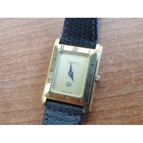 183 - Ladies Vintage Gucci Gold Plated Wrist Watch with Brown Leather Strap, Swiss Made, Quartz Movement (... 