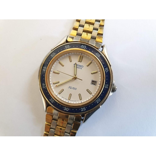 seiko-sq100-wristwatch-with-blue-bezel-date-two-tone-bracelet-strap