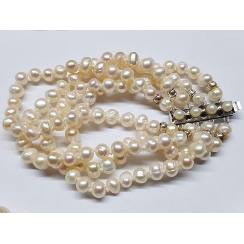 426 - Double Strand Fresh Water Pearl Necklace and Matching Bracelet with Silver Clasp (.835)