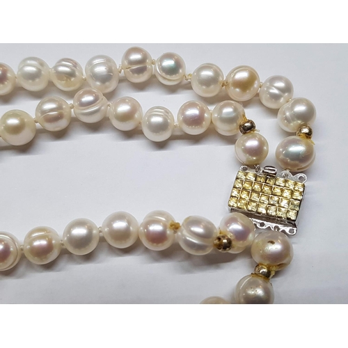 426 - Double Strand Fresh Water Pearl Necklace and Matching Bracelet with Silver Clasp (.835)