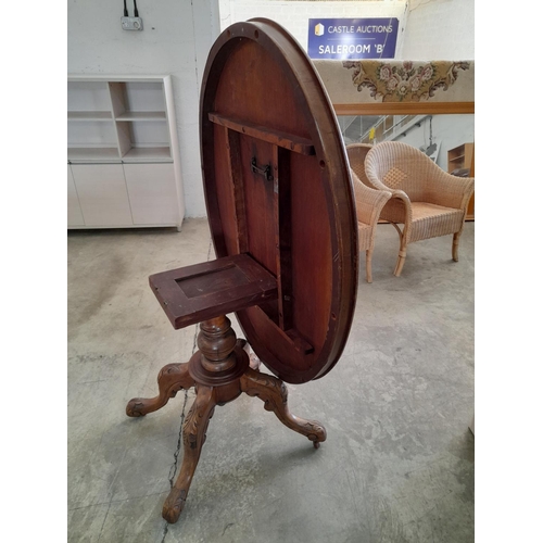 225 - Victorian Tilt-Top Oval Breakfast Table with Turned Pedestal Leg, Carved Tripod Feet and Casters (Ov... 