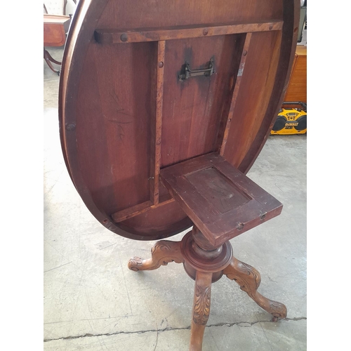 225 - Victorian Tilt-Top Oval Breakfast Table with Turned Pedestal Leg, Carved Tripod Feet and Casters (Ov... 