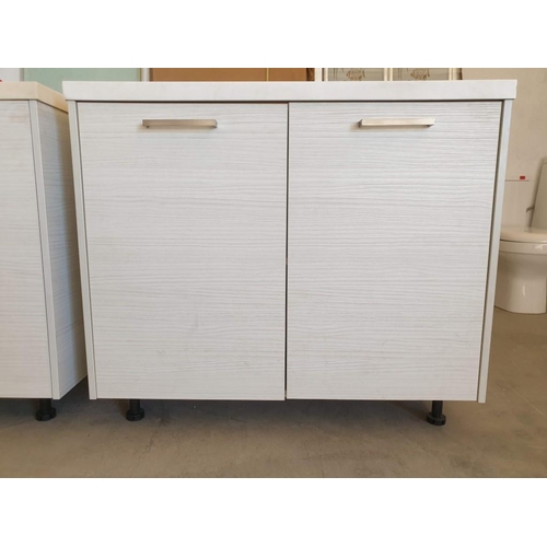 580 - Kitchen Unit; Double Cupboard in Light Wood Effect with White Colour Corian Worktop, Built in Sink a... 