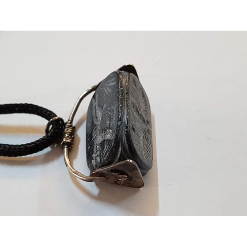 581 - Silver Colour Pendant with Rotating Black Stone, on Rope Necklace
