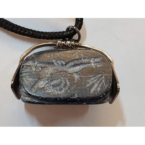 581 - Silver Colour Pendant with Rotating Black Stone, on Rope Necklace