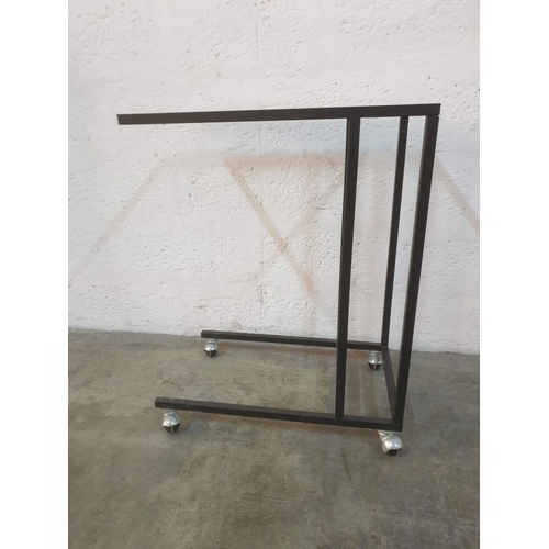 198 - Black Metal Sofa Table with Glass Top on Wheels (Approx. 55 x 35 x 69cm)