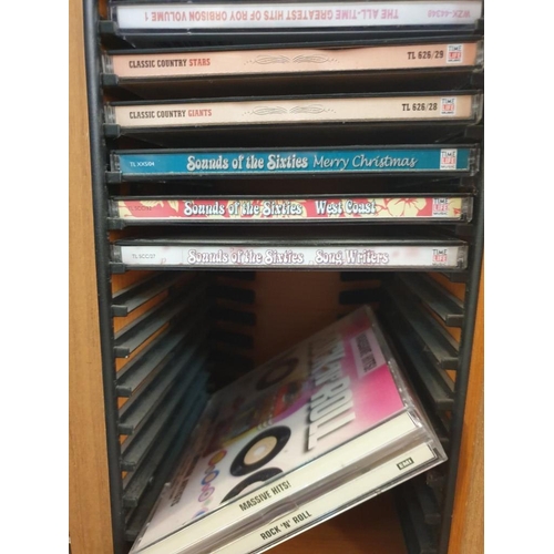 91 - Light Wood Floor Standing Revolving CD Rack (Double Sided) with Large Collection of CD's (Approx. 65... 