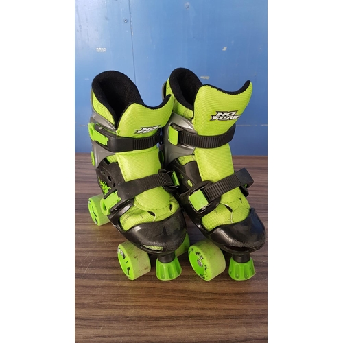 838 - Pair of Roller Skates (Size 28-32) and White Skates (Size 31)