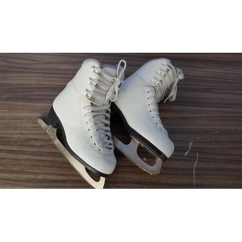 838 - Pair of Roller Skates (Size 28-32) and White Skates (Size 31)