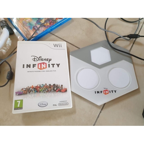 106 - Nintendo Wii (Model No. RVL-101) with 2 x Pairs of Controllers, Disney Infinity and 9 x Games, etc (... 