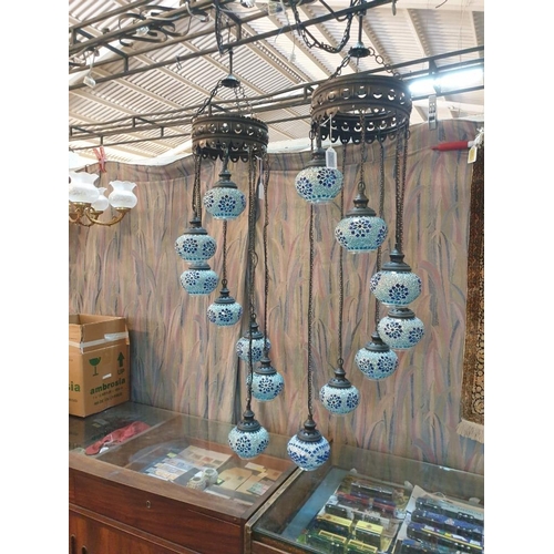 269 - Pair of Arabic Style Ceiling Lights with 7 x Hanging Blue & White Decorated Glass Shades at Graduati... 