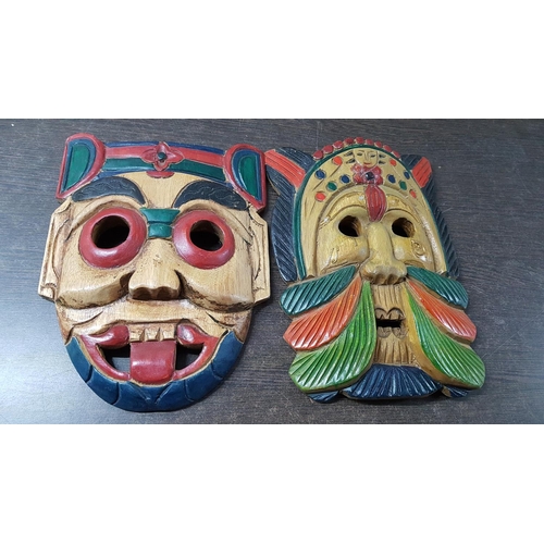 322 - Pair of Wooden Hand Made Ethnic Masks (20 x 26cm and 20 x 25cm)