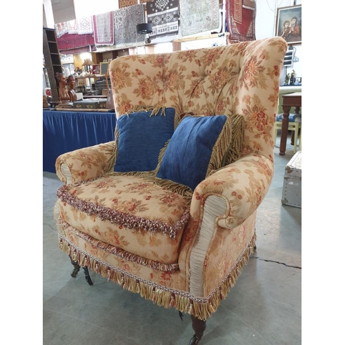 102 - Larger Than Average Antique Style Wing Back Armchair in Floral Fabric, Button Back, Over Turned Wood... 