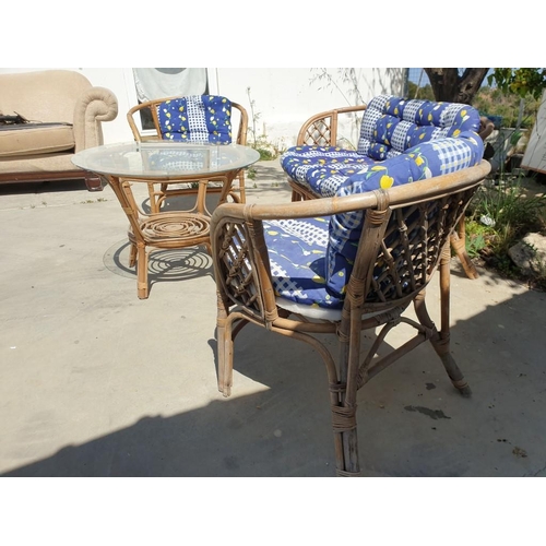 43 - 4-Piece Bamboo Garden Set with 2-Seater Sofa, 2 x Arm Chairs with Seat Cushions and Round Glass Top ... 